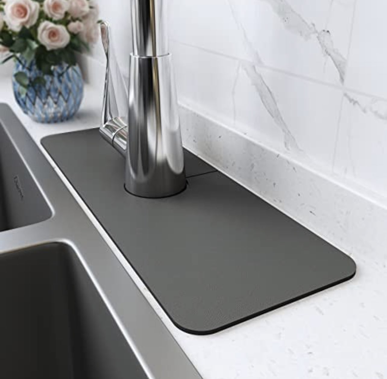 Kitchen & Bathroom Sink Splash Guard. High-tension Silicone